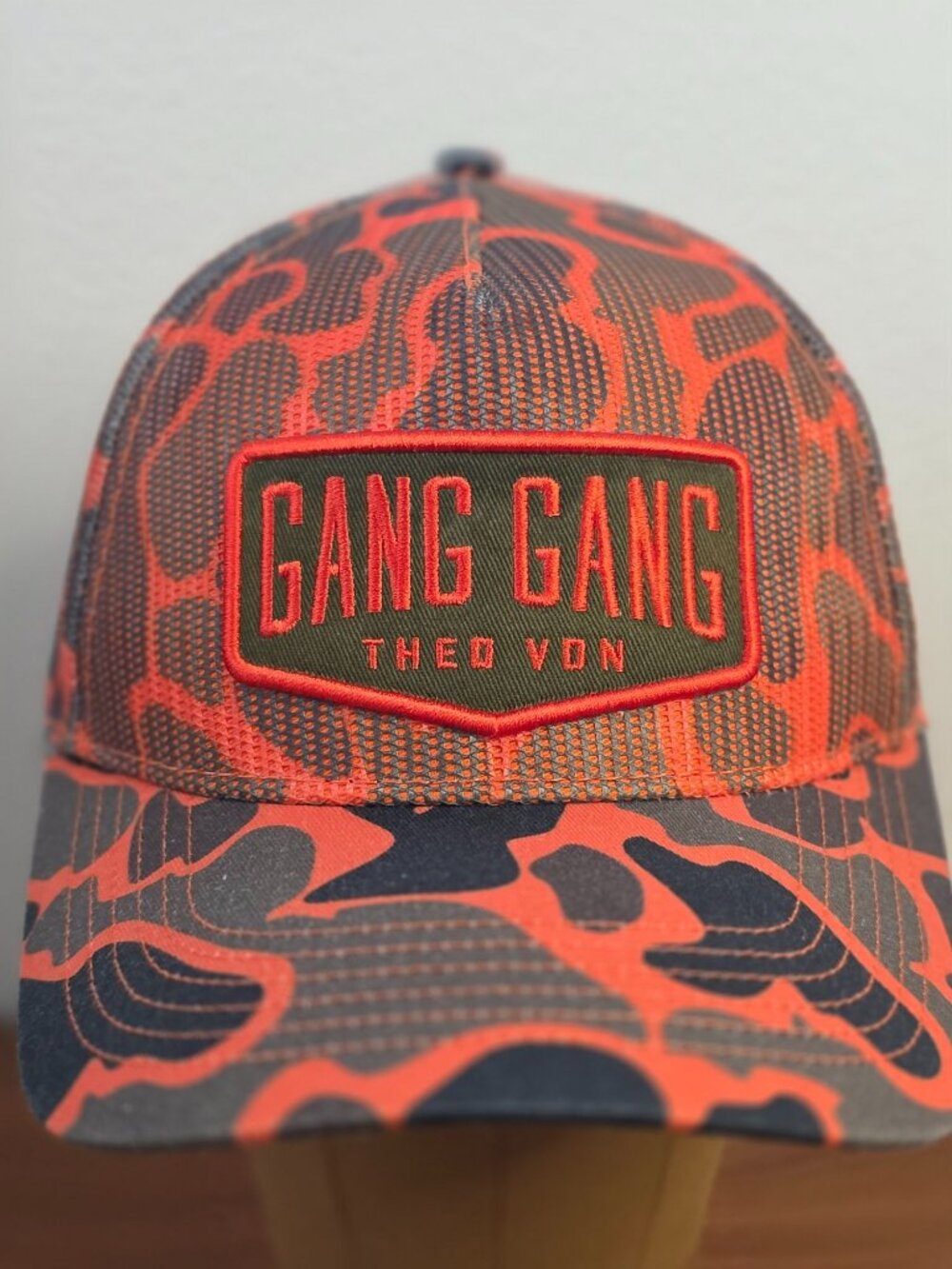 THEO VON Gang Gang Orange Camo Mesh Snapback Trucker Hat